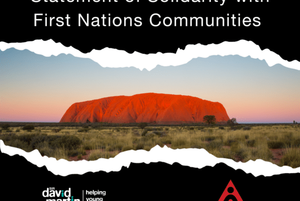 Uluru with the title 'Statment of Solidarity with First Nations Communities'