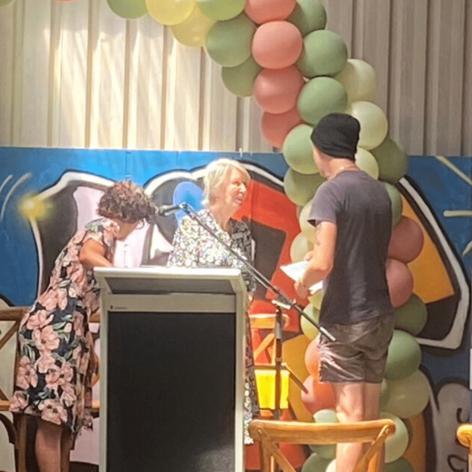 Lady Martin presents a Martin Foundation scholarship to a young person at the Triple Care Farm graduation ceremony