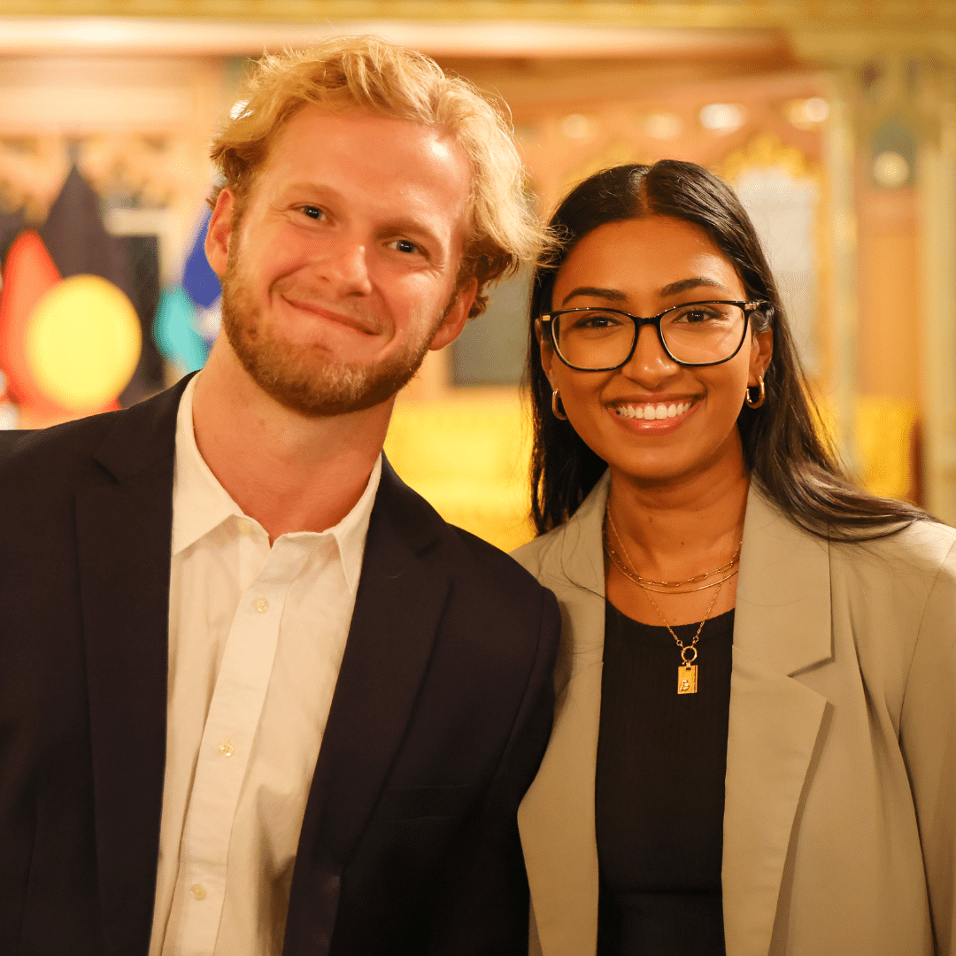 Harry Waterworth and Jessica Pereira, two young people in their 20s, smiling