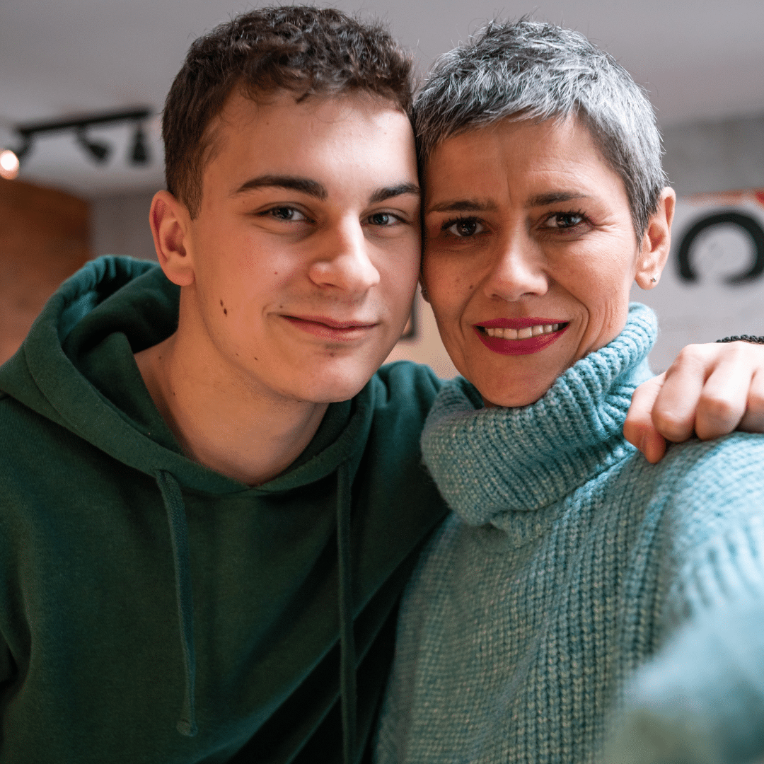 mother and son smiling together